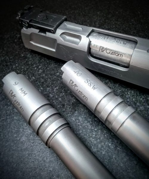 Esempi di canne 1911, 9mm standard barrel e .40S&W Bull Barrel con Kit-Conv  sullo sfondo